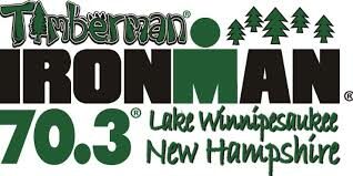 The logo for timberman ironman 703.