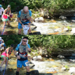 Two pictures of people running through a stream.