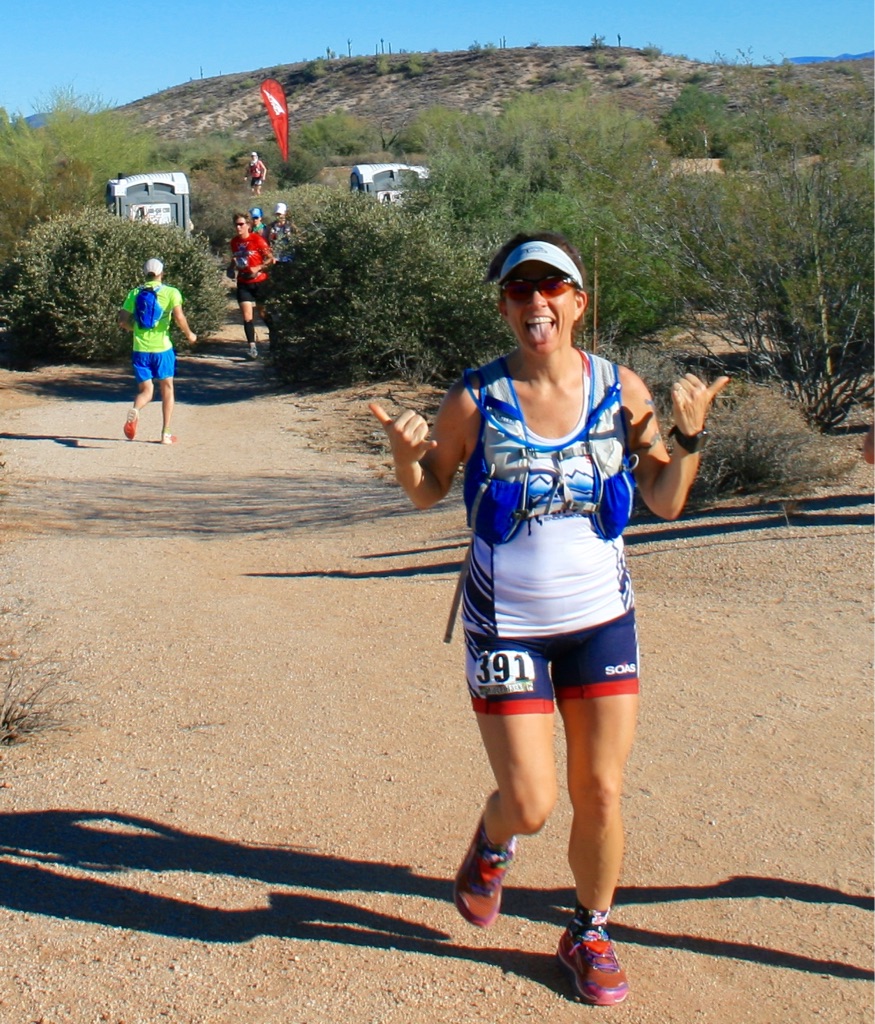 Woman running a race.