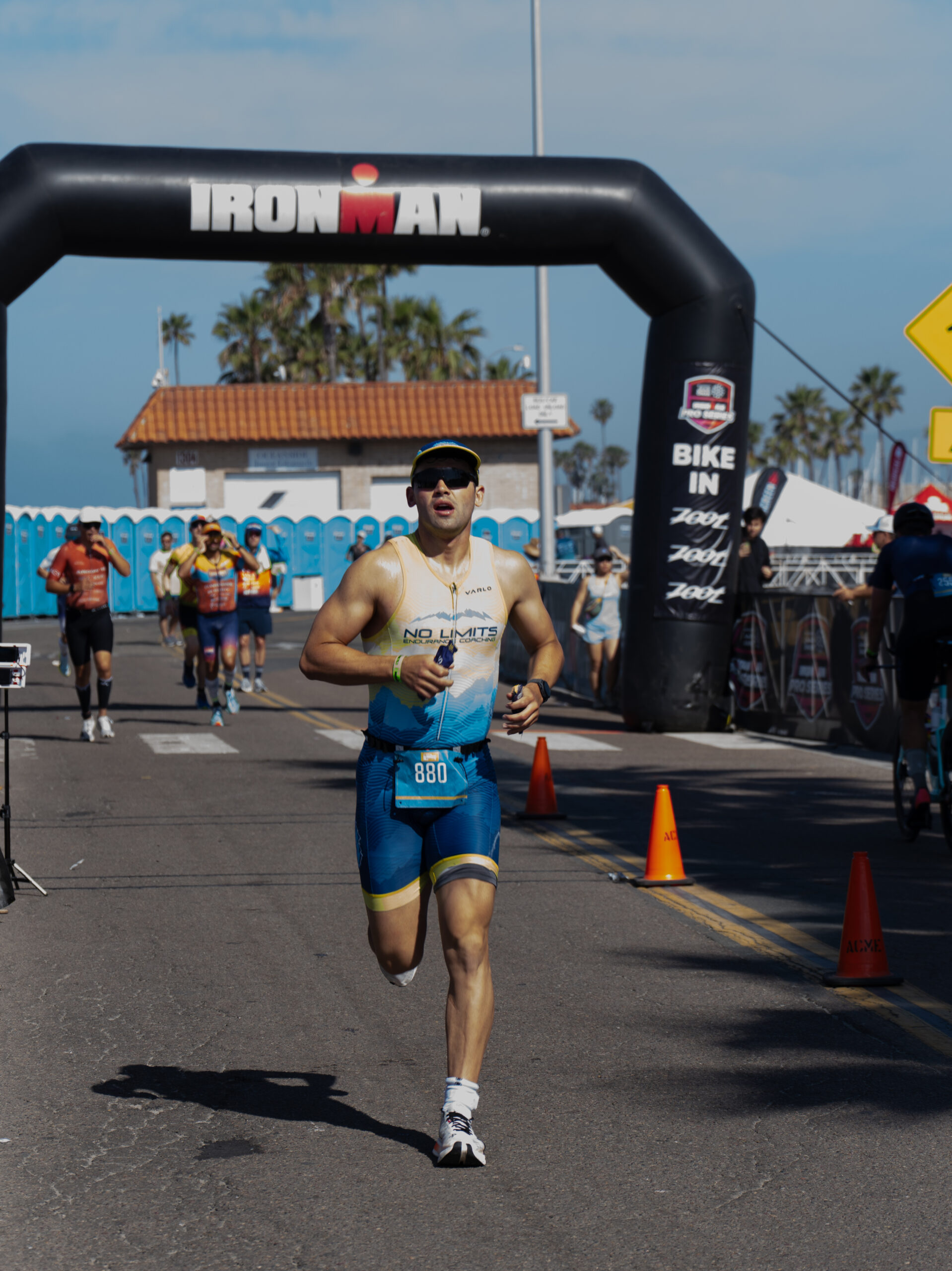 Triathlete running on Ironman course. 