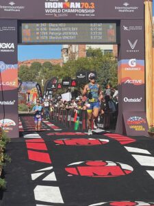 woman finishing 70.3 worlds